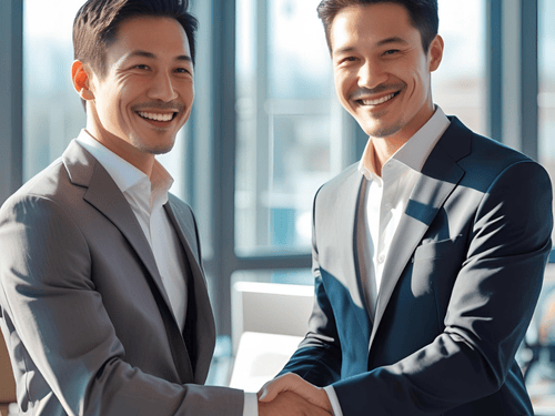 Two professionals shaking hands after closing a logistics partnership with a trusted fulfilment center